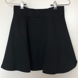Quilted black skater skirt